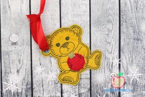 Christmas teddy bear holding red ball. ITH Ornament