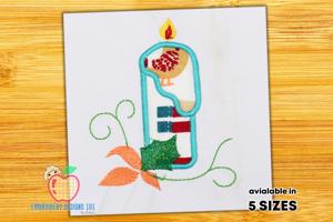 Candle Lightining With The Design Applique Patter\n